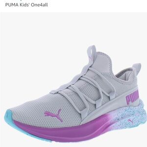 PUMA sneakers new in box. Grey with hints of purple and teal. Size 5 big kid.